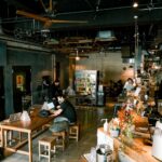 a group of people working in a shop